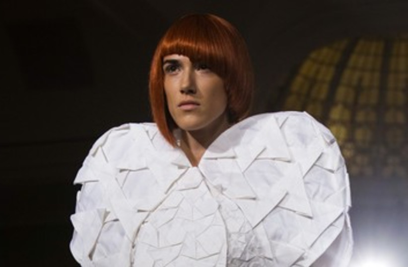 Model presents threeASFOUR Spring/Summer collection piece 37 (photo credit: REUTERS/Eric Thayer)
