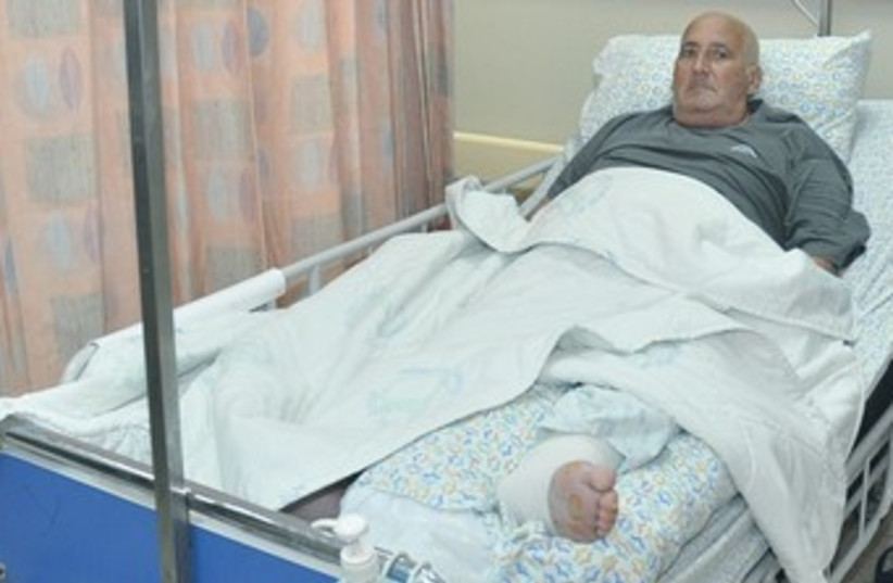 Shlomo Lankri in his bed at Emek Medical Center 370 (photo credit: Courtesy Emek Medical Center)