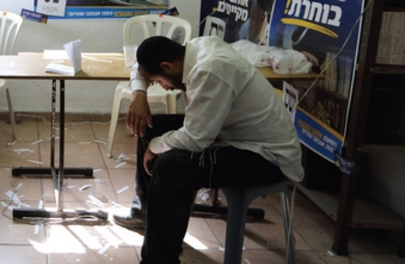 Shas party activists in Bnei Brak during the municipal elec (photo credit: YAACOV NAUMI / FLASH 90)