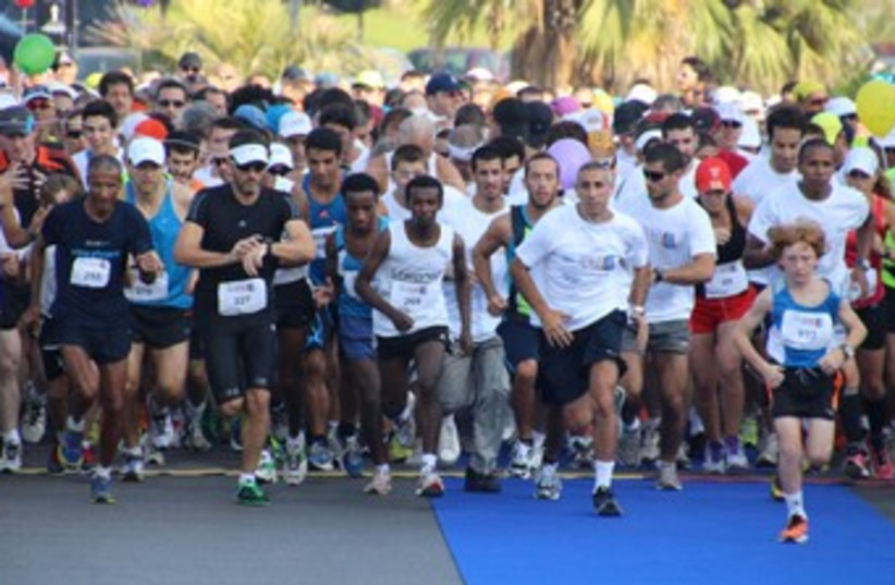 many runners, running 370  (photo credit: Courtesy, ELEM)