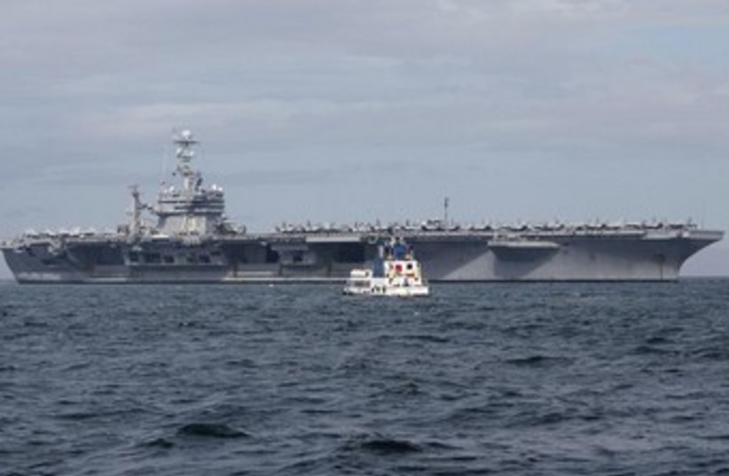 USS George Washington  370 (photo credit: REUTERS)