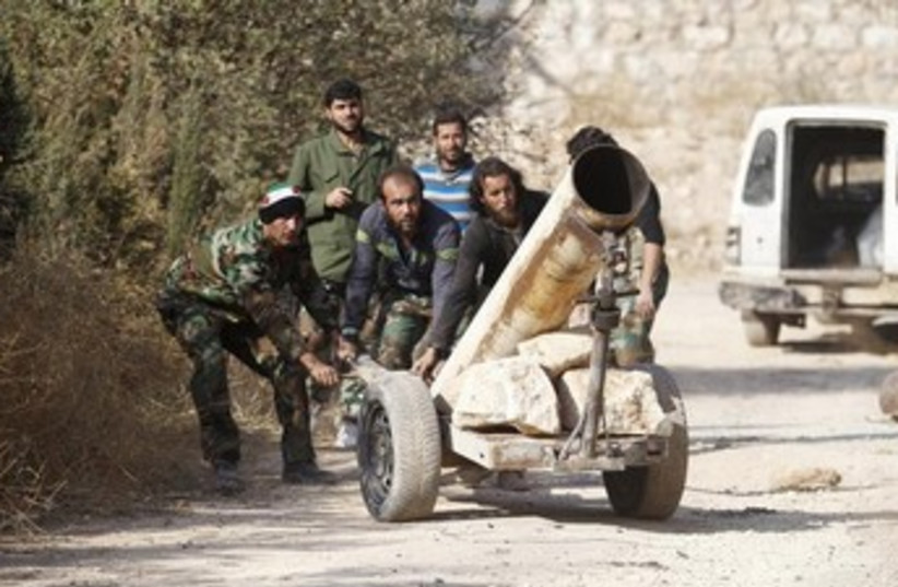 Syrian Islamist fighters 370 (photo credit: REUTERS)
