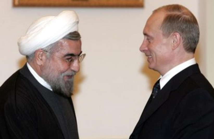 Rouhani and Puting 370 (photo credit: REUTERS/Viktor Korotayev CVI/MA)