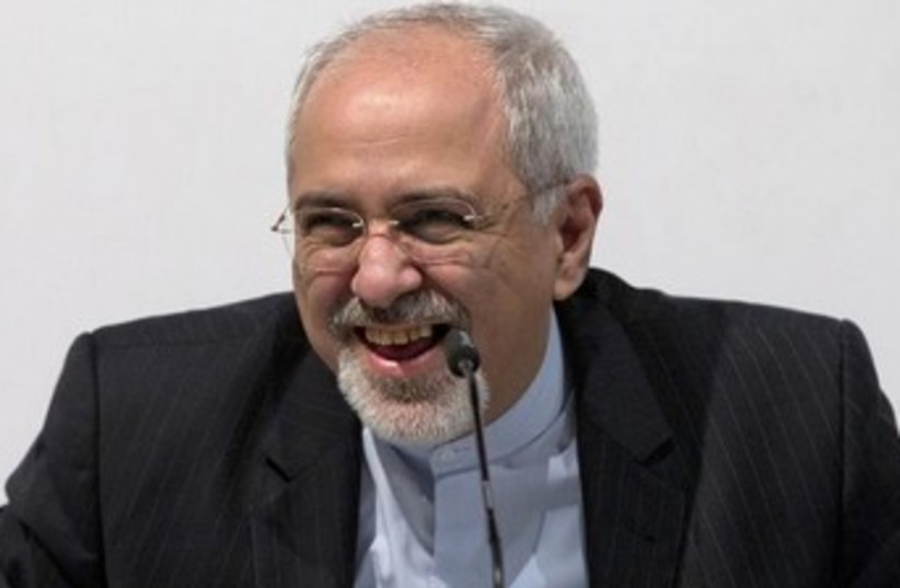 Iranian Foreign Minister Zarif at a Geneva news conference 3 (photo credit: REUTERS)