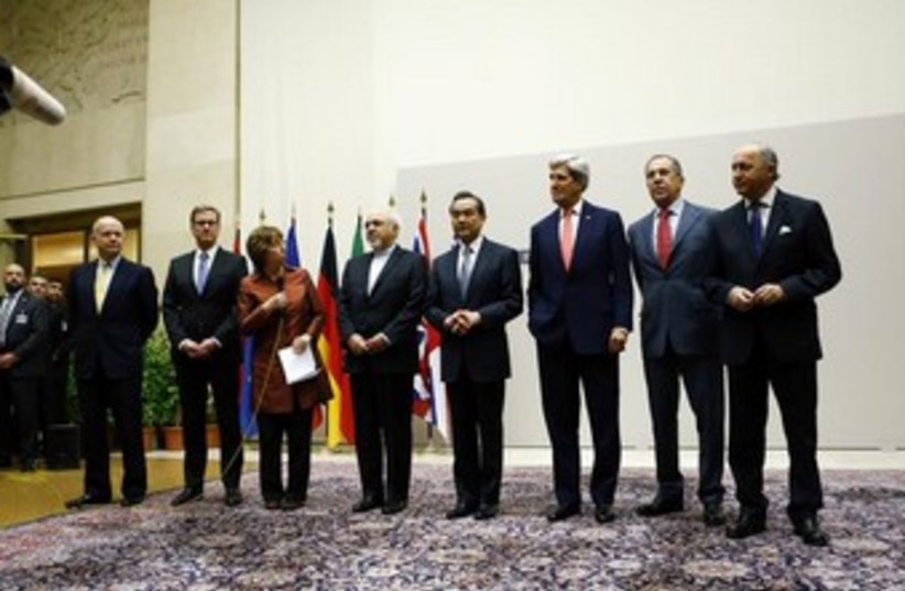 Geneva nuclear talks diplomats in line 370 (photo credit: REUTERS/Denis Balibouse)