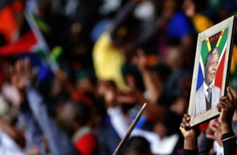 Mandela funeral in South Africa crowds 370 (photo credit: REUTERS/Yves Herman)