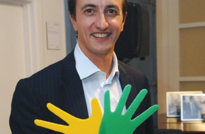AUSTRALIAN AMBASSADOR Dave Sharma with hands for peace 370 (photo credit: Courtesy Australian Embassy)