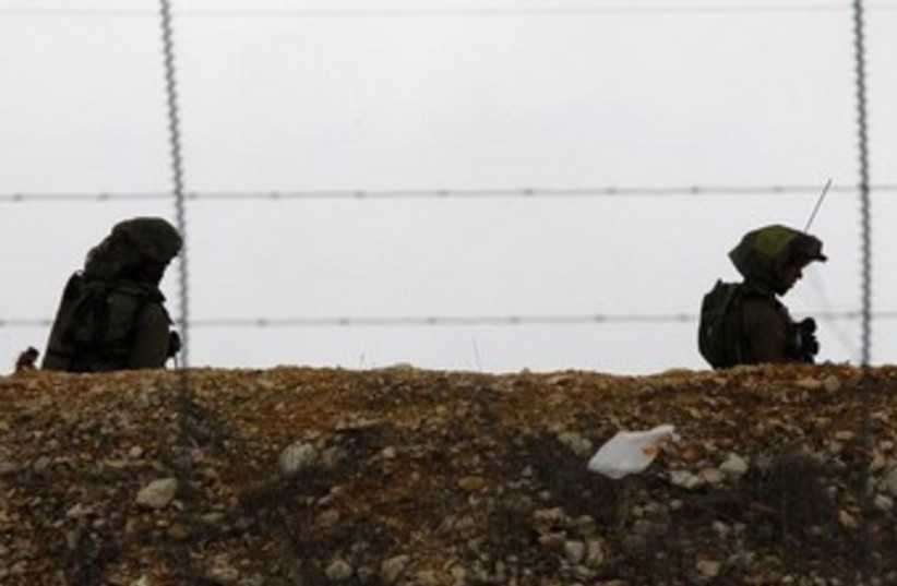 IDF soldiers on Lebanon border 370 (photo credit: REUTERS/Ali Hashisho )
