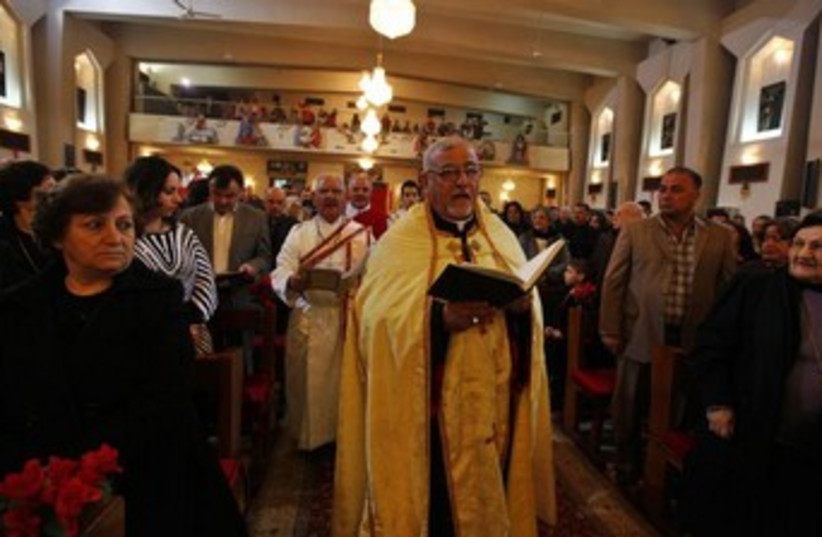 Iraqi Christians at mass 370 (photo credit: REUTERS)