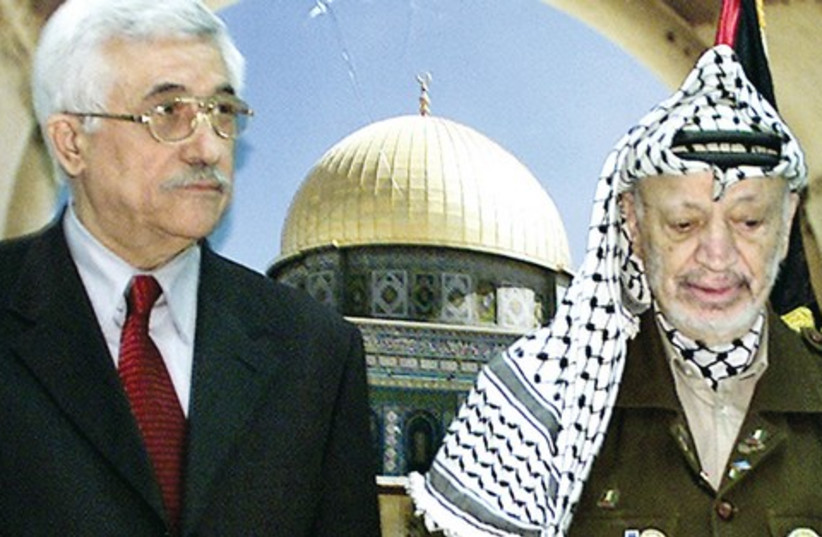 Mahmoud Abbas and Yasser Arafat in Ramallah in 2003. (photo credit: REUTERS)