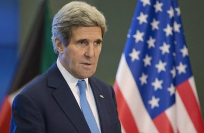US Secretary of State John Kerry speaks to the press in Kuwait (photo credit: Reuters)