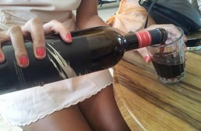 Woman and wine (photo credit: Courtesy)