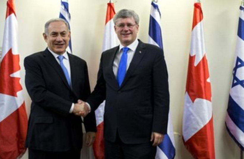 Prime Minister Binyamin Netanyahu and Canada's Prime Minister Stephen Harper in Jerusalem, January 21, 2014. (photo credit: REUTERS)
