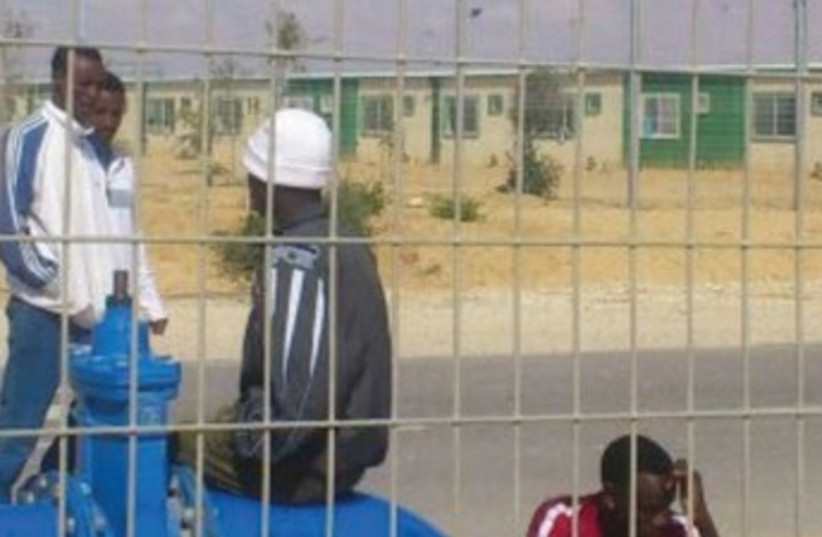 DETAINEES PASS the time  at the Holot detention facility in the western Negev. (photo credit: BEN HARTMAN)