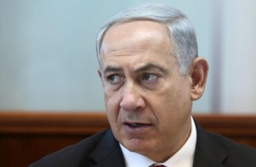 Netanyahu arrives at weekly cabinet meeting (photo credit: MARC ISRAEL SELLEM/THE JERUSALEM POST)