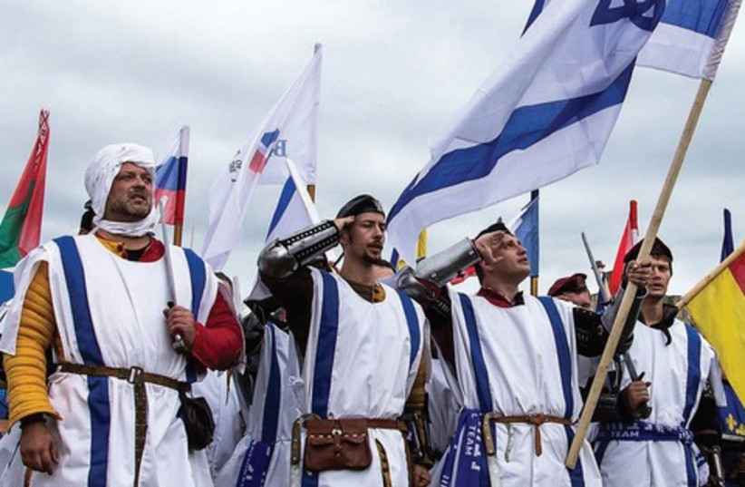 Israeli sword fighters salute their flag in the latest sport craze (photo credit: COURTESY MICHAEL MORGULIS)
