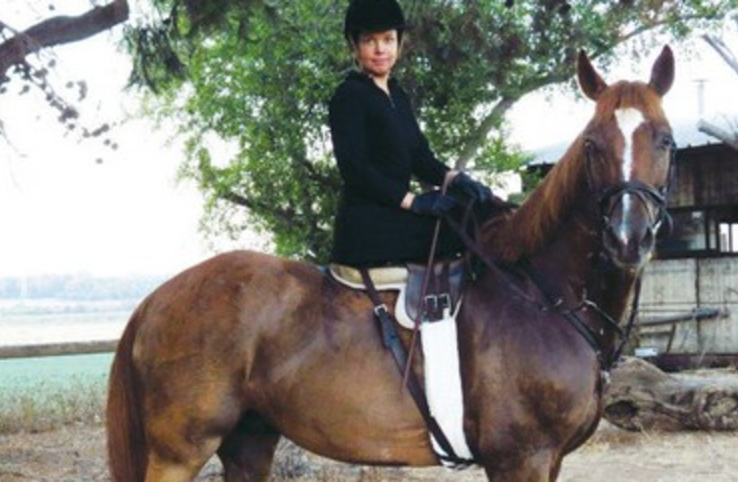 GABRIELLA HIRSCHSPRUNG poses on her horse. (photo credit: ISRAEL SIDE SADDLE ASSOCIATION)
