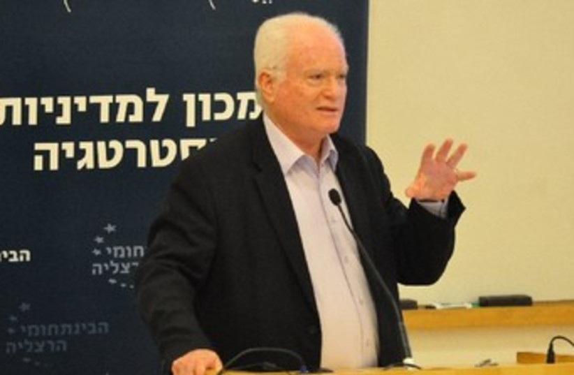Amos Gilad speaking at conference (photo credit: KOBI ZOLTAK)