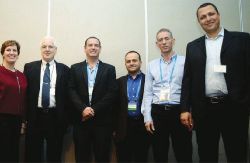 Members of Titanium and the Jerusamlem Venture Partners: (photo credit: BRIAN L. FRANK)