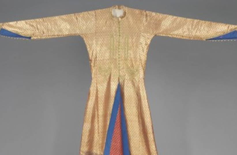 Men's coatwith a ‘hamsa’ in its lining, Calcutta, India, late 19th century. (photo credit: COURTESY ISRAEL MUSEUM)