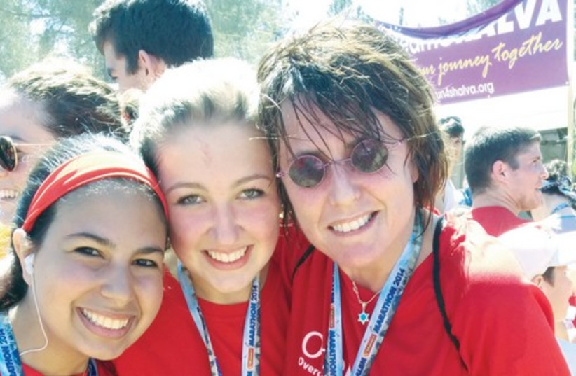 Kay Wilson (right) with members of the Team OneFamily at the Jerusalem Marathon. (photo credit: Courtesy)
