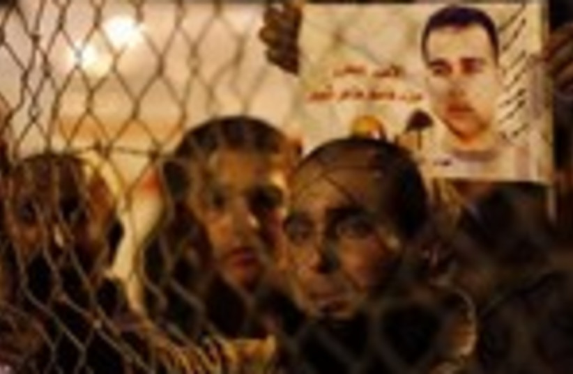 Palestinians celebrate prisoner release 390 (photo credit: REUTERS)