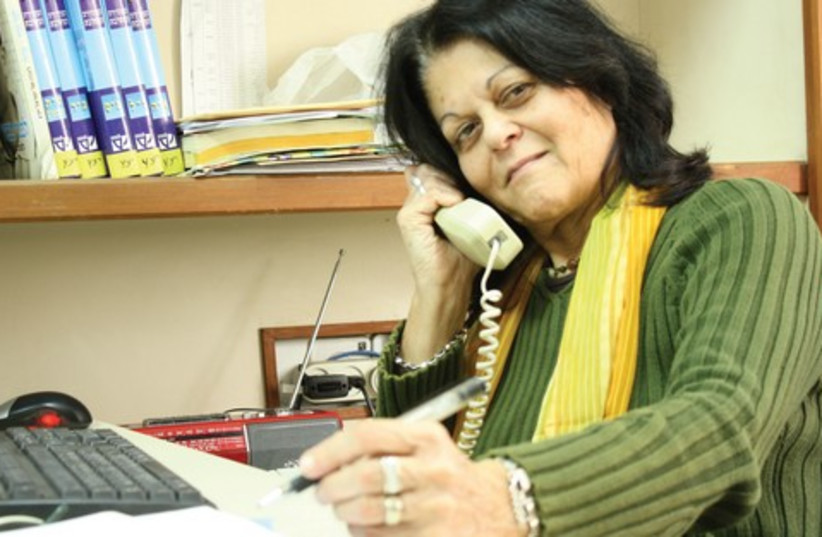 RUTH ALMAGOR-RAMON sits in her office at the Israel Broadcasting Authority. (photo credit: EHUD STAMLER)