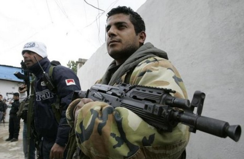 Armed Fatah men at Mieh Mieh camp in Lebanon (photo credit: REUTERS)