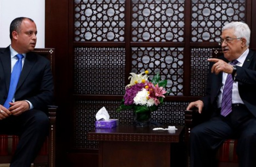 Hilik Bar and Mahmoud Abbas, April 16, 2014 (photo credit: REUTERS)