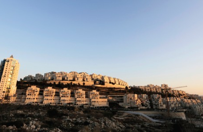 A panoramic view of the Har Homa neighborhood in south Jerusalem. (photo credit: AMMAR AWAD / REUTERS)