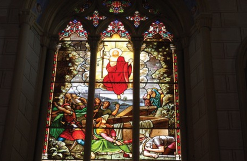 A stained-glass window in the Latin Patriarchate. (photo credit: SHMUEL BAR-AM)