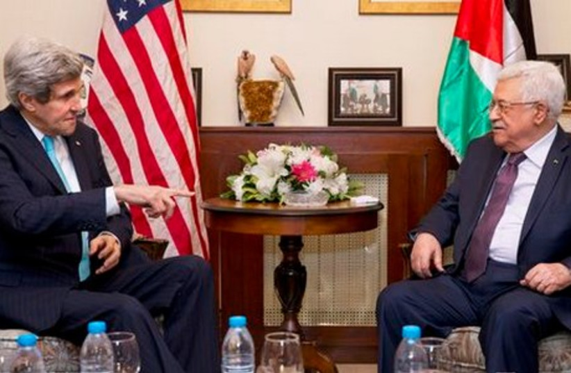 US Secretary of State John Kerry with Palestinian Authority President Mahmoud Abbas (photo credit: REUTERS)