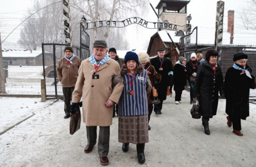 Holocaust survivors arrive at Auschwitz (photo credit: REUTERS)