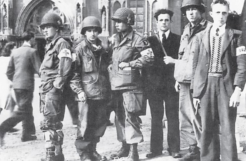 Eindhoven Resistance with troops of the 326th Medical Company (101st Airborne) (photo credit: Wikimedia Commons)