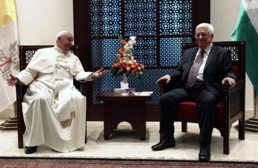 Pope Francis (L) meets Palestinian Authority president Mahmoud Abbas in the West Bank town of Bethlehem May 25, 2014. (photo credit: REUTERS)