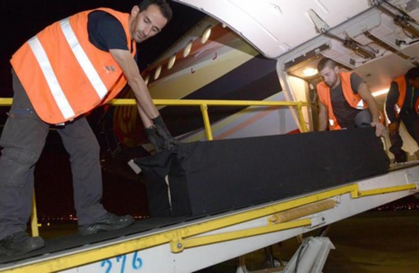 The bodies of Emanuel and Mira Riva are returned to Israel (photo credit: GPO)