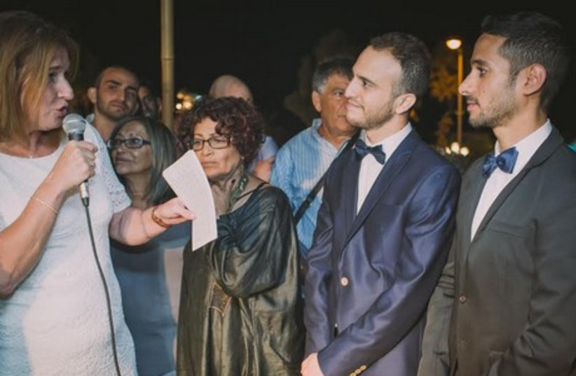 Tzipi Livni presides over wedding ceremony of Tsach Sa'ar and Guy Arad. (photo credit: COURTESY/YONI SHERMAN)