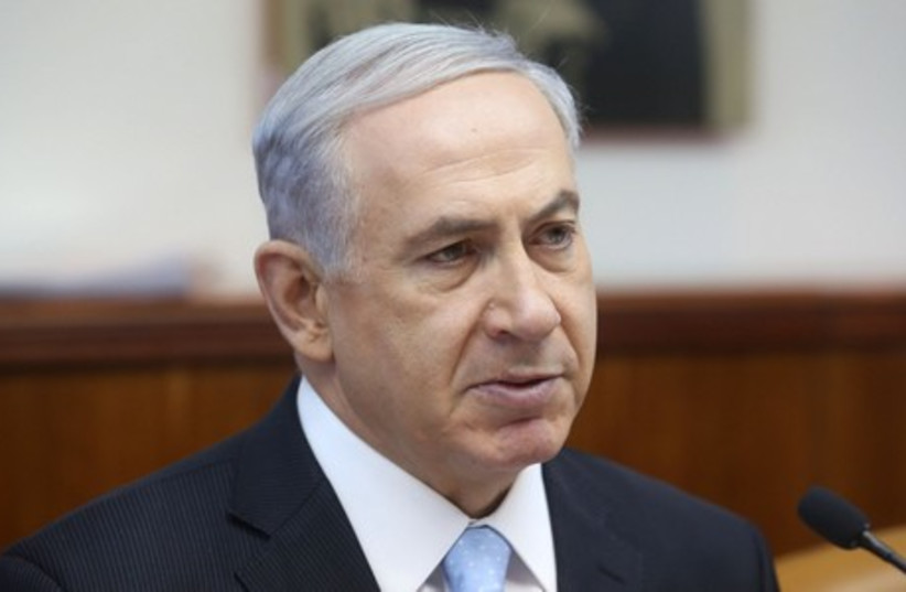 Prime Minister Binyamin Netanyahu at the weekly cabinet meeting on Sunday, June 22, 2014. (photo credit: MARC ISRAEL SELLEM/THE JERUSALEM POST)