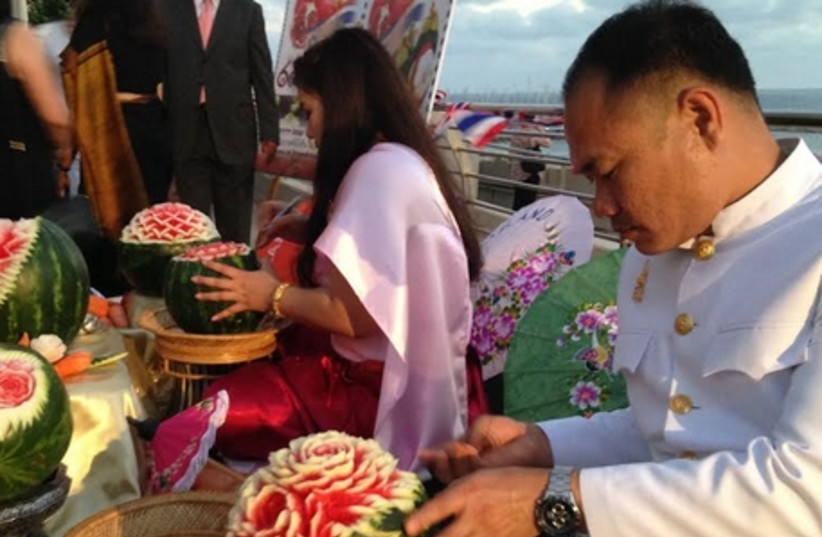 Carving fruit at Thai Embassy event, June 24, 2014.  (photo credit: NATHAN WISE)