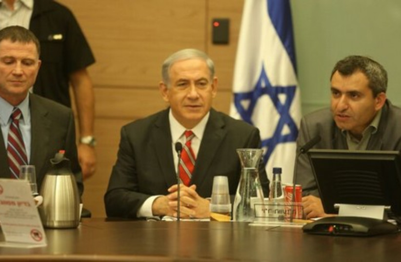 Prime Minister Binyamin Netanyahu at Knesset Foreign Affairs and Defense Committee meeting, June 30, 2014 (photo credit: MARC ISRAEL SELLEM/THE JERUSALEM POST)