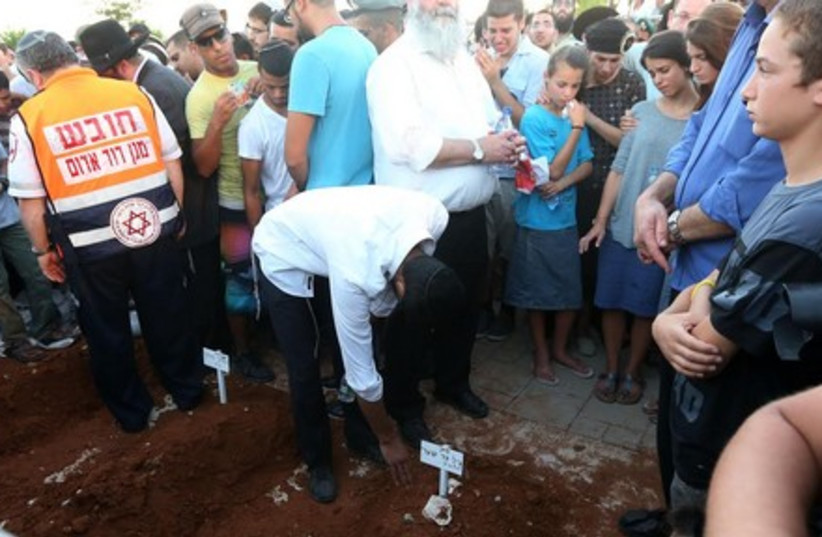 Funeral for the three kidnapped Israeli teens, July 1, 2014. (photo credit: MARC ISRAEL SELLEM/THE JERUSALEM POST)