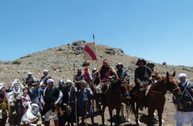 ENTHUSIASTS PARTICIPATE in a previous reenactment of the 1187 Battle of Hattin between the Crusader Kingdom of Jerusalem and the forces of the Ayyubid dynasty. (photo credit: Courtesy)