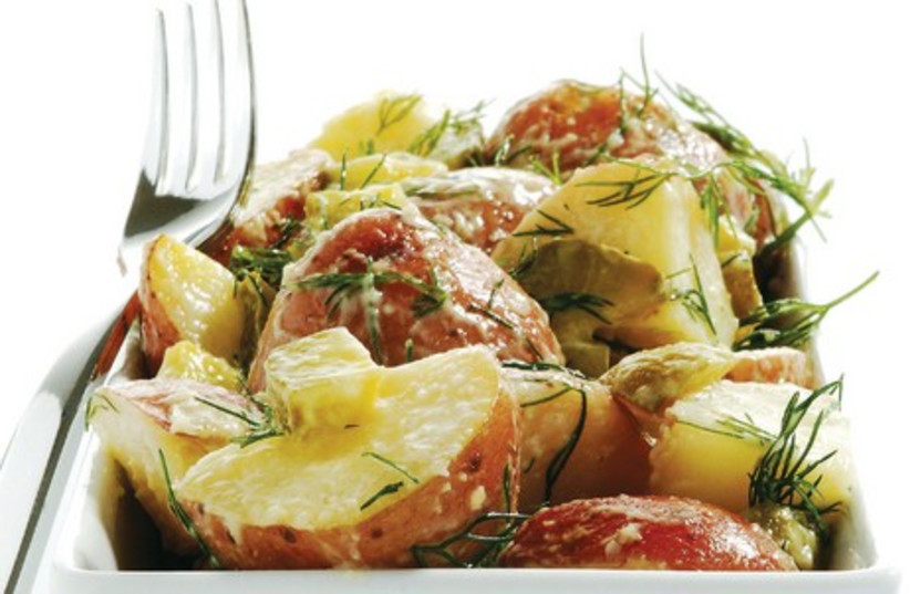 Potatoes are dressed with light mayonnaise-mustard dressing and dill in this summery salad (photo credit: SAM FRIEDMAN)