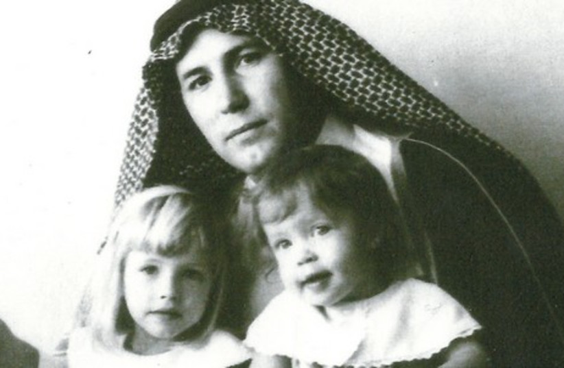 Bob Ames in Saudi Arabia, Christmas 1964, with his daughters, Catherine and Adrienne (photo credit: COURTESY NANCY AMES HANLON)