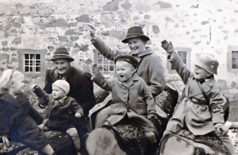 Children doing a Hitler salute in 1938 (photo credit: COURTESY FRIEDEMANN DERSCHMIDT)