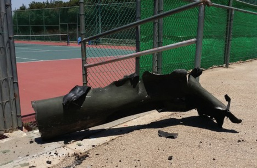 Debris from rocket at Rehovot community center, July 10, 2014. (photo credit: SHARON UDASIN)