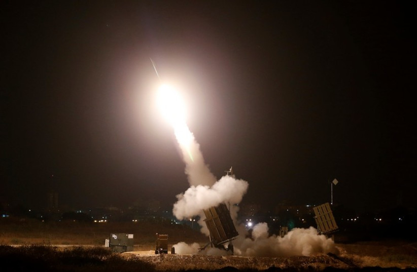 An Iron Dome launcher fires an interceptor rocket in the southern Israeli city of Ashdod (photo credit: REUTERS)