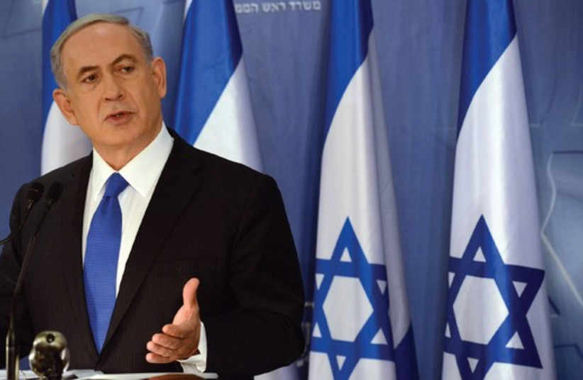 PRIME MINISTER Binyamin Netanyahu speaks at a press conference in Tel Aviv on Friday (photo credit: HAIM ZACH/GPO)