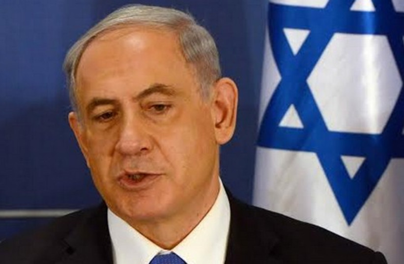 Prime Minister Binyamin Netanyahu at the weekly cabinet meeting in Tel Aviv, July 13, 2014. (photo credit: HAIM ZACH/GPO)
