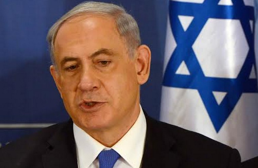 Prime Minister Binyamin Netanyahu at the weekly cabinet meeting in Tel Aviv, July 13, 2014. (photo credit: HAIM ZACH/GPO)